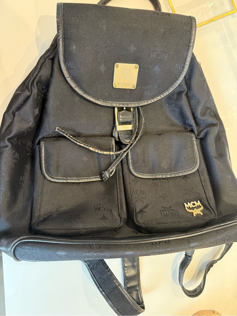 MCM Black Nylon Logo Drawstring Backpack with Gold Plaque